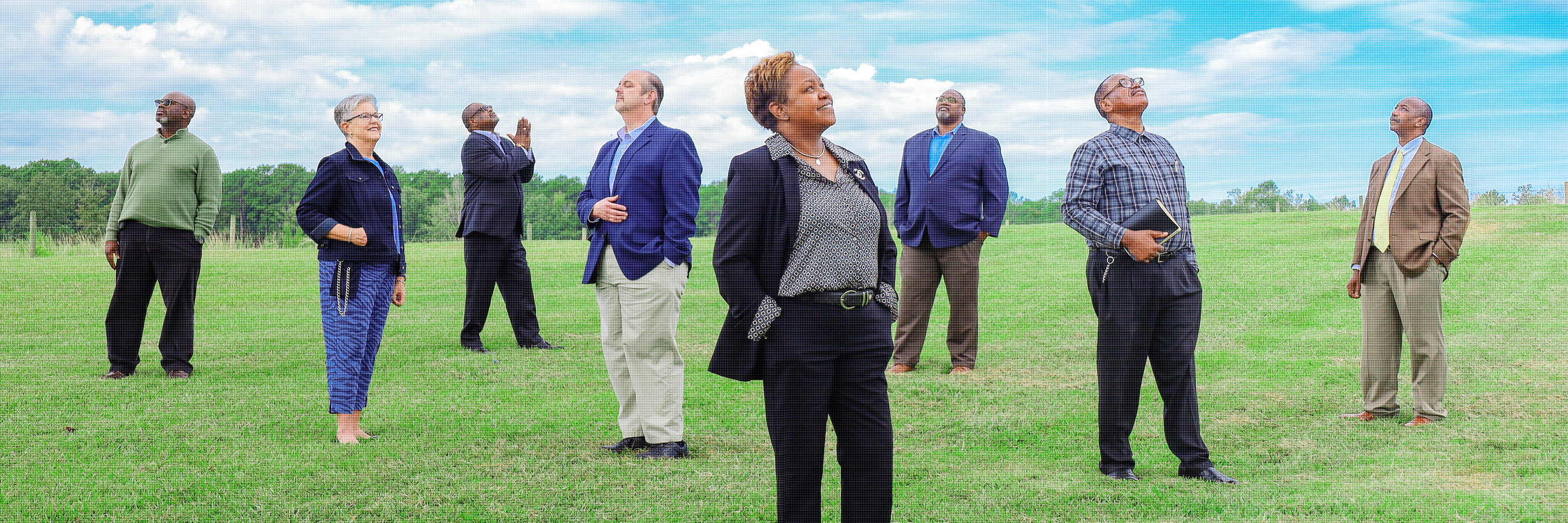 Chaplains outdoor on a sunny day looking up to the sky