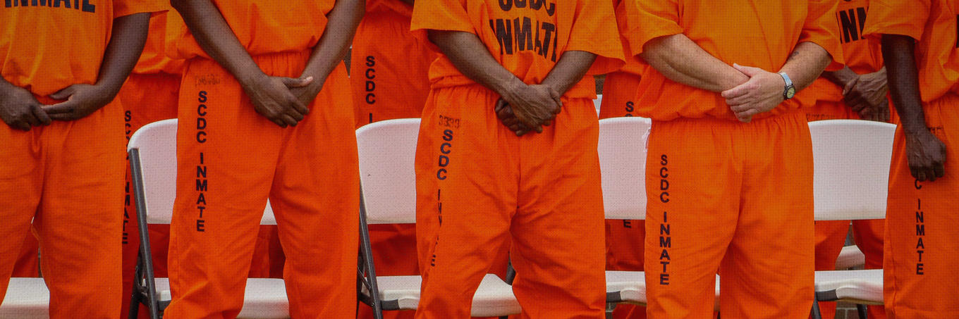 Inmates standing side by side